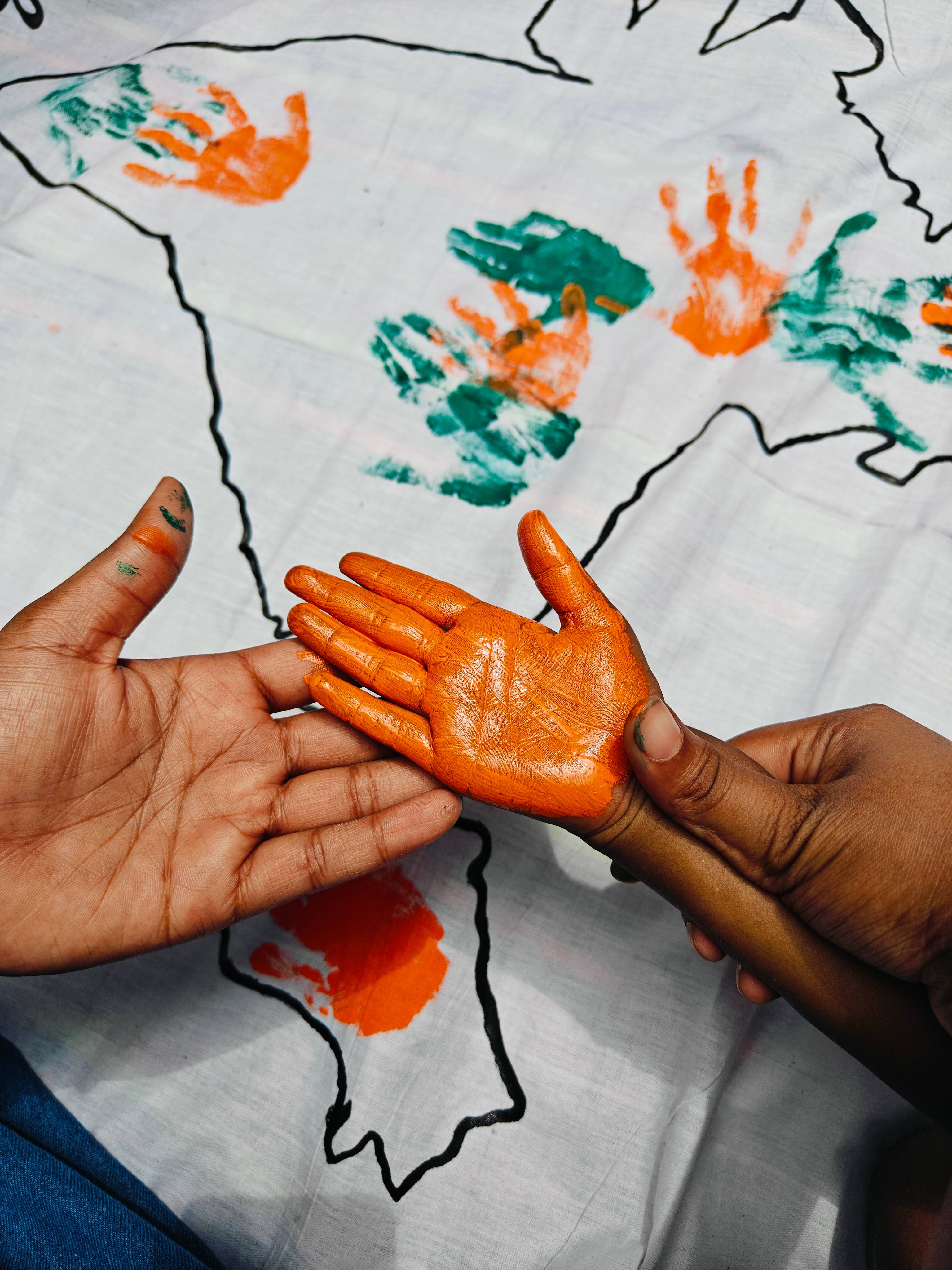 Children with painted hands forming the map of India - Sukalp Foundation hero image
